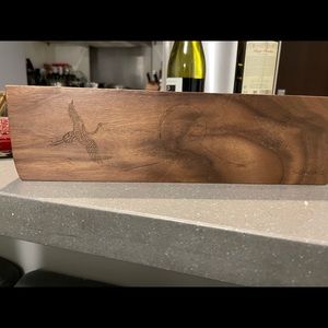 Sonia G- A beautiful piece but I feel the wood used was way too dark.